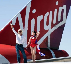 Sir Richard Branson and Dita Von Tease on the aircraft wing