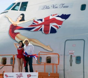 Sir Richard and Dita Von Tease alongside the personally named aircraft