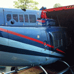 Bell Helicopter squeezing into a container